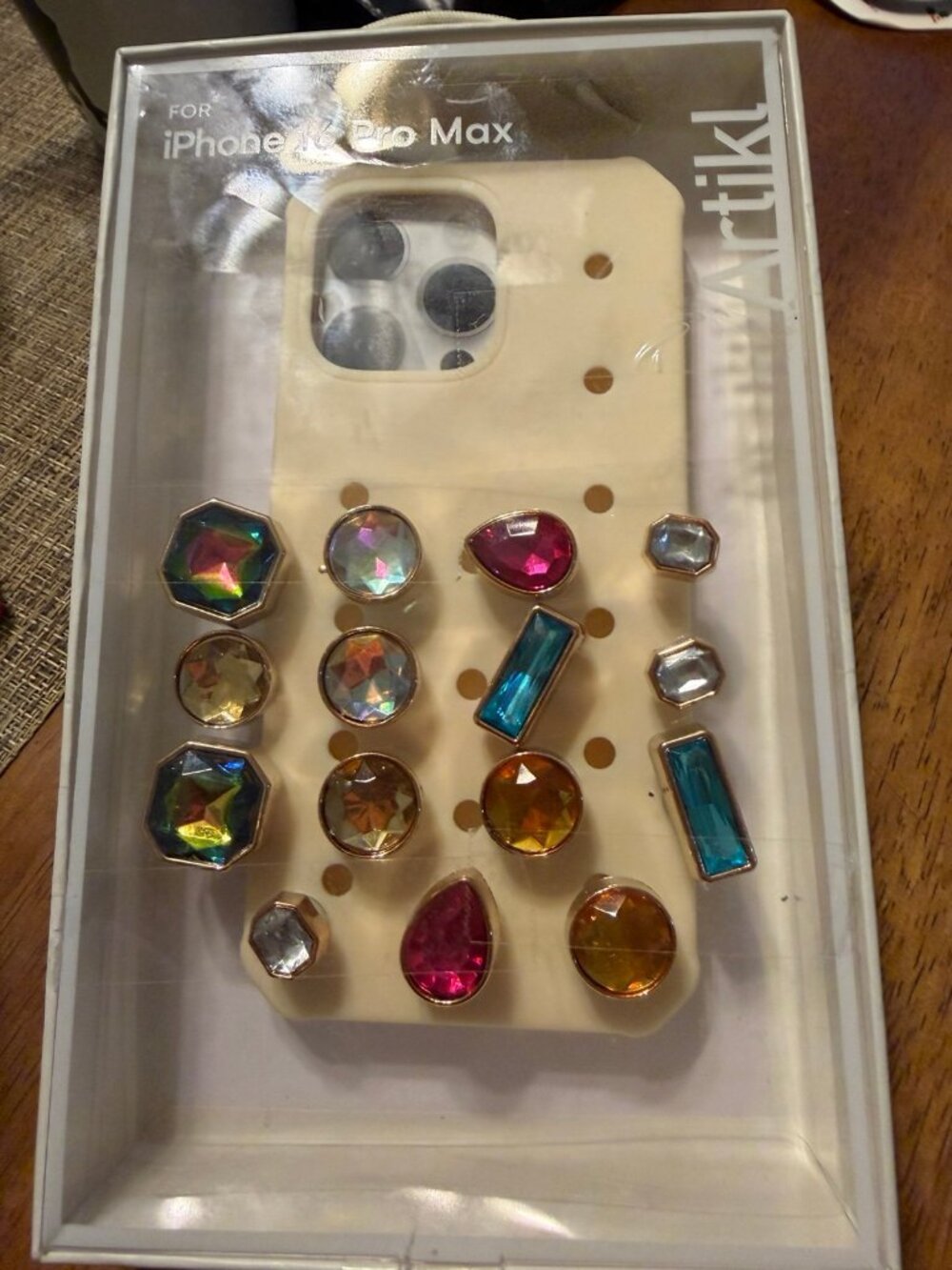 Artikl Pop Charms phone case, specifically designed for the iPhone 16 Pro Max